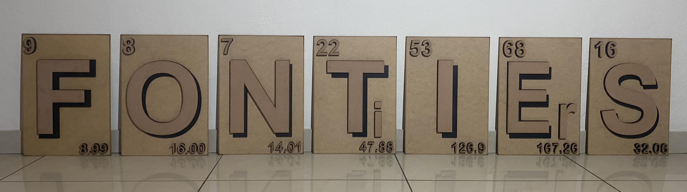 Precision laser-engraved letters and numbers in high-quality materials for signage and custom décor.